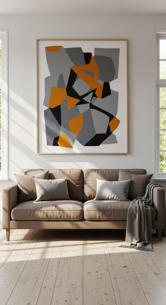 Simple small living room with one large piece of wall art for a clean design.